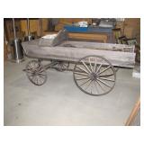 with wooden spoke wheels>