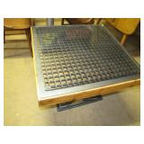 turned into table with glass top>