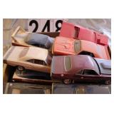 Box of Mostly Completed Cars