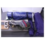 Blue Tote of Camping Equipment Includes Tents