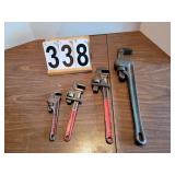 4 Different Sized Pipe Wrenches