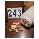 Jar Of Wooden Thread Spools
