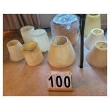 Group Of Lamp Shades With One White Ruffles