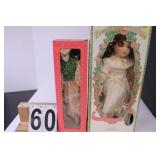 Pair of Porcelain Dolls