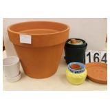 Plastic And Terra Cotta Flower Pots