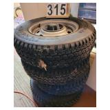 4 Wrangler 205 75 X 15 Tires on Jeep Rims