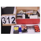 Box of Cassette Tapes w/ REO Speedwagon