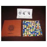 Vintage Akro Agate Marbles and box.  Tri color