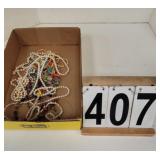 Flat w/ Beaded Necklaces