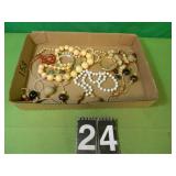 Flat of Costume Jewelry