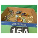 Flat with 9 Pieces of Costume Jewelry