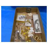 Flat of Jewelry with bracelet-necklaces- and pins