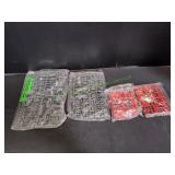 (4) Packets of Model Parts