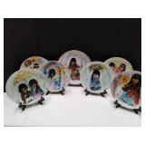 (7) De Grazia Decorative Plates w/ Stands