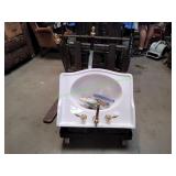 Porcelain Bathroom Sink w/ Gold Fixtures