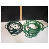 (2) Green Extension Cords (2) Green Extension Cords