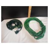 (2) Green Extension Cords (2) Green Extension Cords