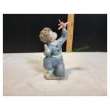 6.5" Nao by Lladro Boy w/ Toy Jet Figurine 6.5" Nao by Lladro Boy w/ Toy Jet Figurine