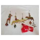 (4) Hand Carved Wood Ornaments (4) Hand Carved Wood Ornaments