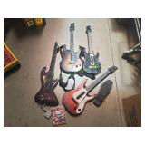 (4) Guitar Hero Guitars w/ Foot Peddle & PS3 Game