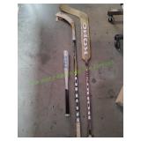(2) Hockey Sticks & (1) Baseball Bat