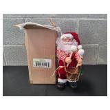 Santa Playing Drums Figurine