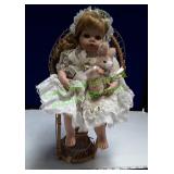 Baby Porcelain Doll Siting On Chair