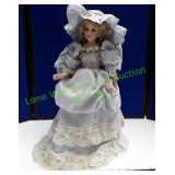 Light Blue Dress Porcelain Doll