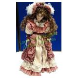 Brownish Redish/ White Porcelain Doll