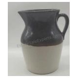 Clay crock pitcher.  Marked USA.