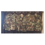 Military style camouflaged field jackets.  Sizes