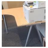 Modern L-shaped desk with wood top. 30ï¿½ï¿½63ï¿½47.