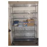 Metro shelf on casters. 76ï¿½48ï¿½14. Shelf contents