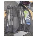 Feather banner sign poles. Banners are ripped.