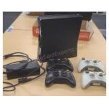 XBOX 360 gaming system. Includes power box and 4