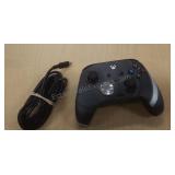 XBOX controller. Includes cord.
