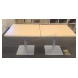 Pedestal tables with Formica tops. Set of 2