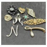 Group of 9 Brooches