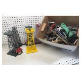 Bix of Train Parts Light Towers Crossing Signals