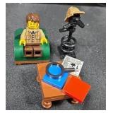 LEGO Sherlock Holmes mini figure with sofa chair.