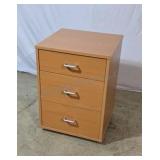 3-drawer cabinet. Faux wood Formica finish.