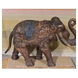 Hand carved wooded elephant. 31×48×14. Trunk is