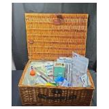 Wicker basket with arts and crafts supplies.