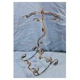 Wine glass rack. Copper colored metal. 19ins.