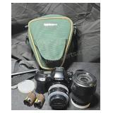 Minolta Dynax SPxi 35mm camera body with two