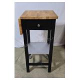 Butcher block top kitchen trolley. Flip up side.