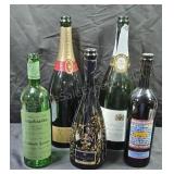 Empty souvenir wine and Champagne bottles.