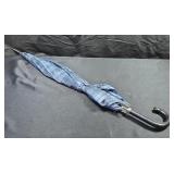 Umbrella with black leather handle. Push button