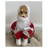 Vintage Santa sitting on chimney