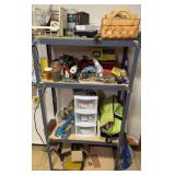 4 shelf storage rack with contents. Rack is 5